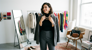 A chic, editorial-style photograph of a stylish woman effortlessly updating her outfit with statemen